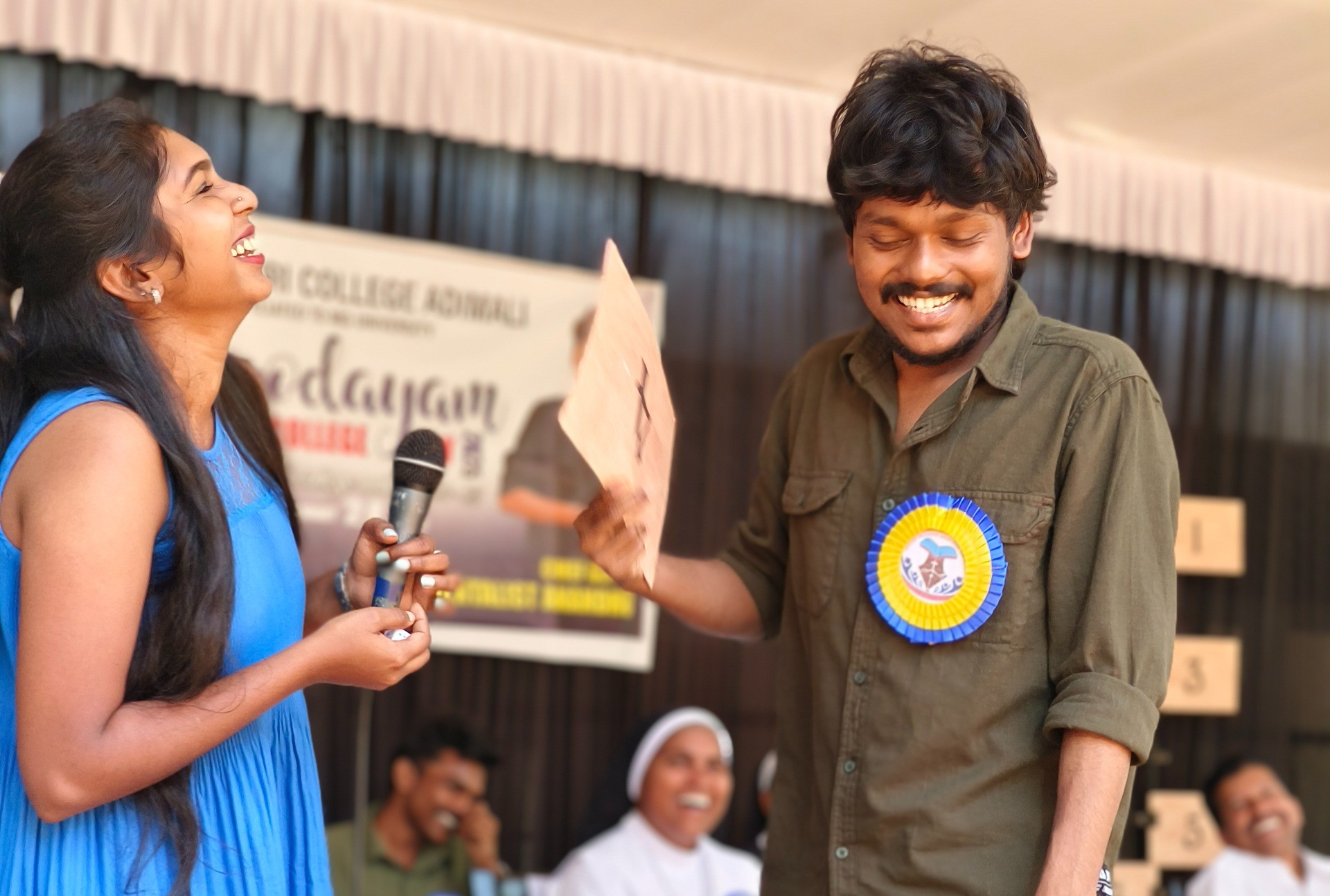 Students conducting research in a science lab at Carmelgiri College